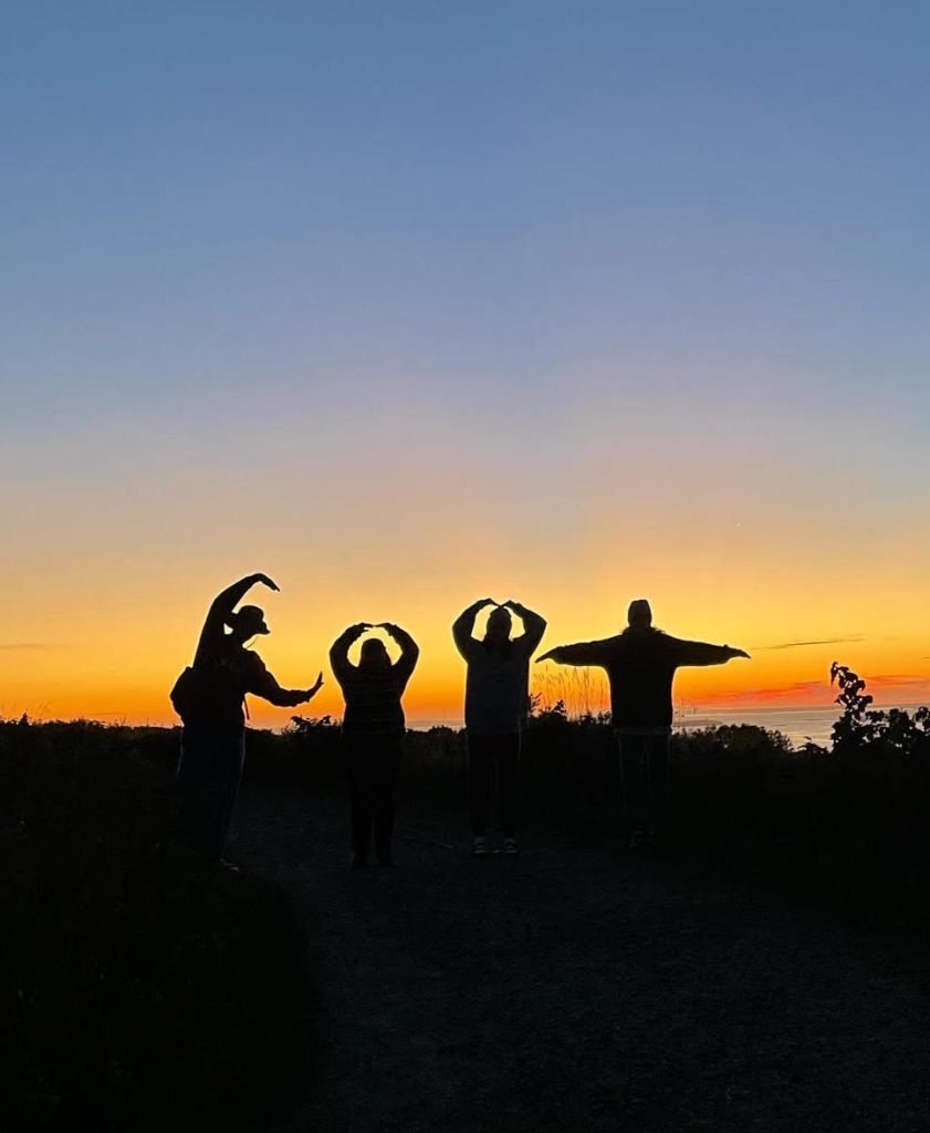 Students with sunset